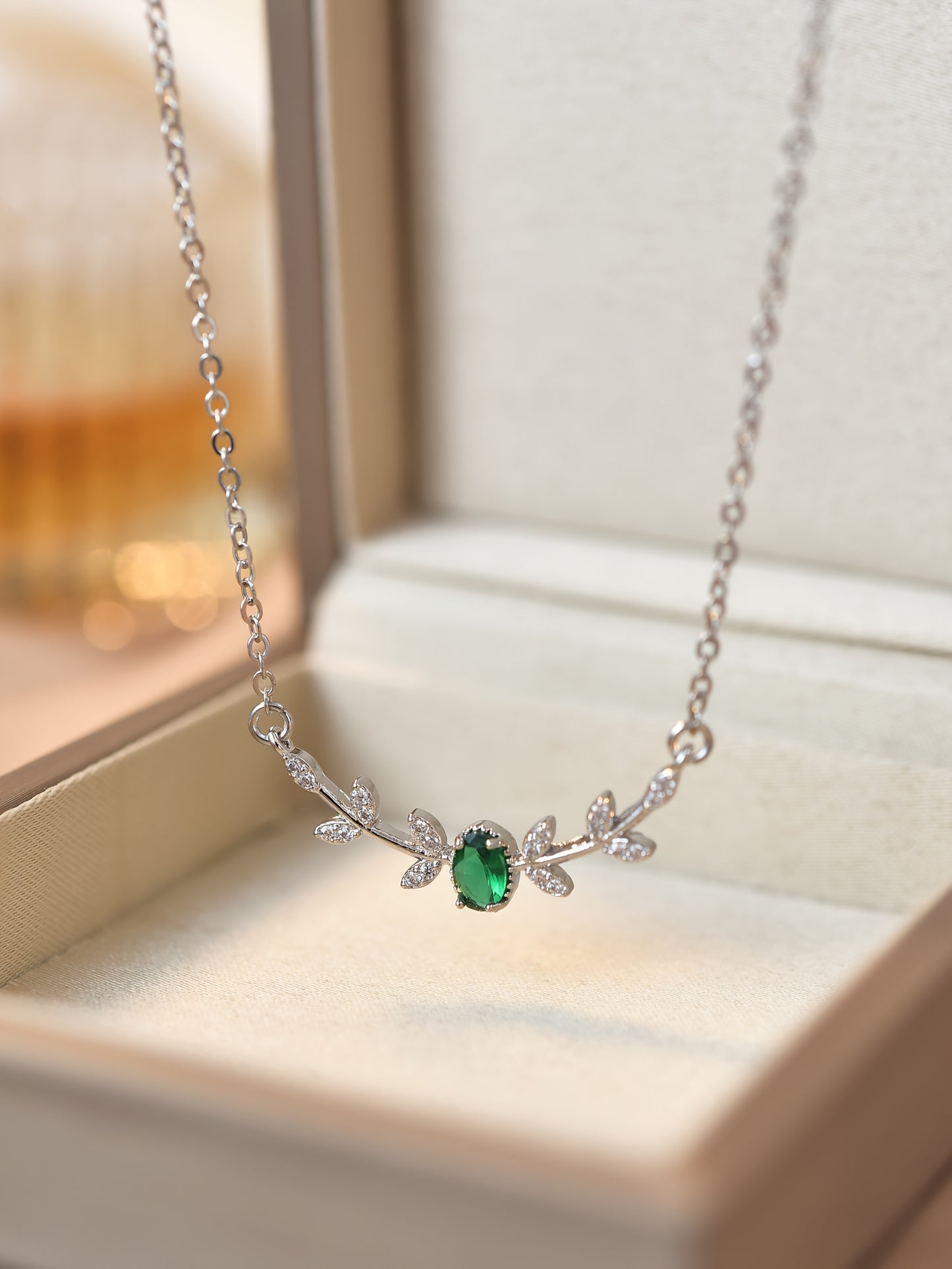 Golden-Tone Copper Leaf Necklace with Green Zircon